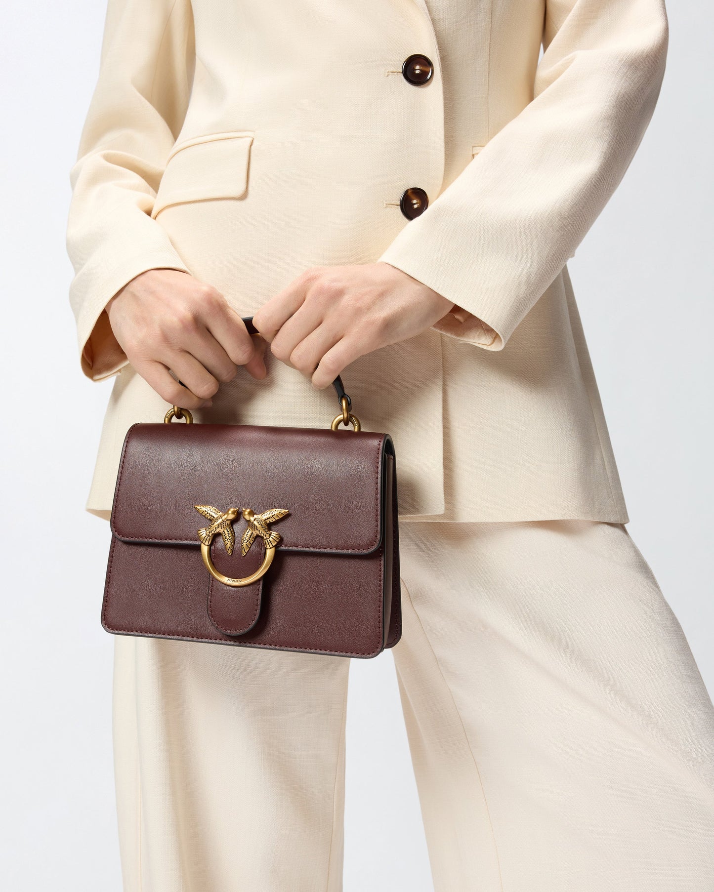 Mini handbag Love Bag Top Handle in leather