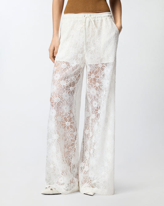 Trousers in floral embroidered lace