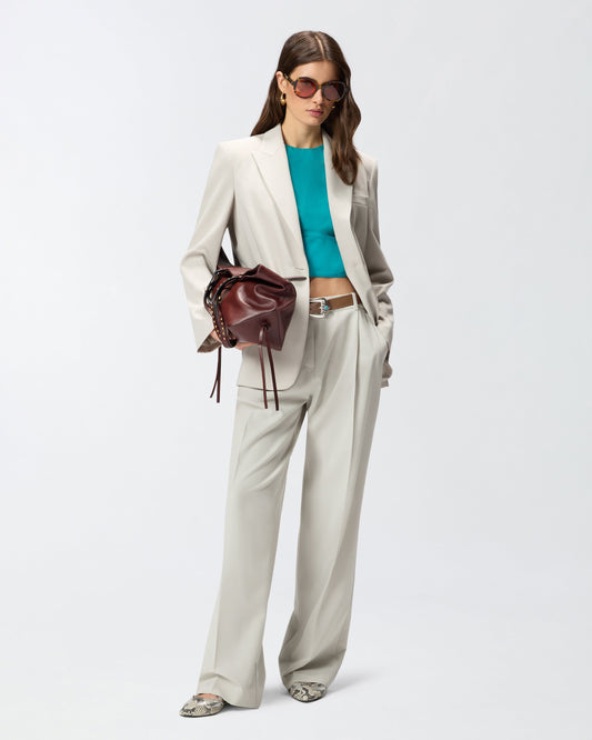 Fluid blazer with rear slit
