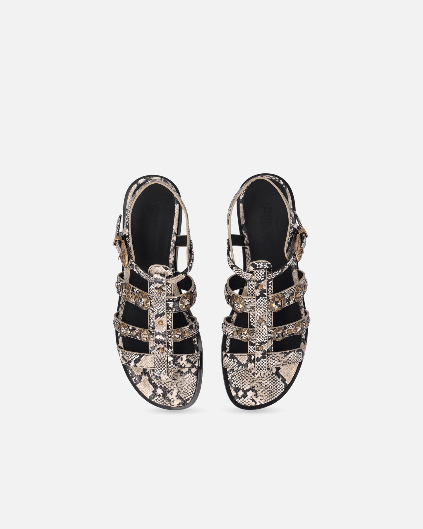 Flat leather sandals with python print and studs