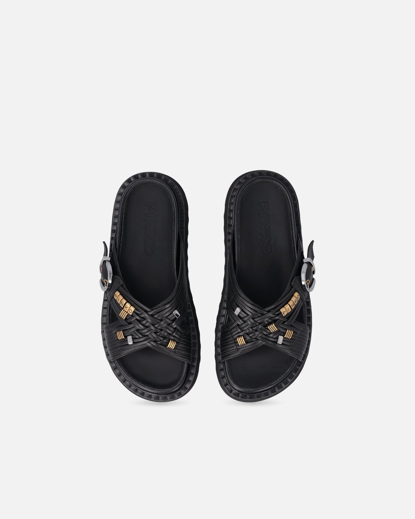 Woven nappa leather slip-on sandals with metallic rings