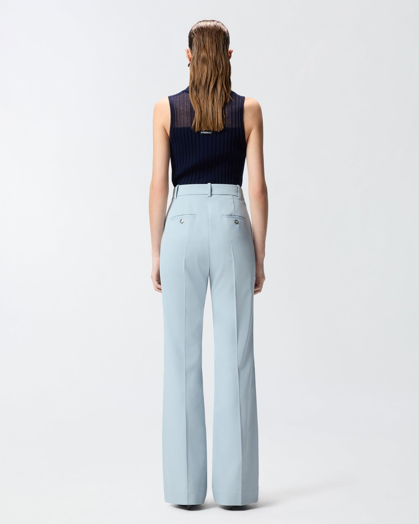 Flared trousers with pressed pleat detail