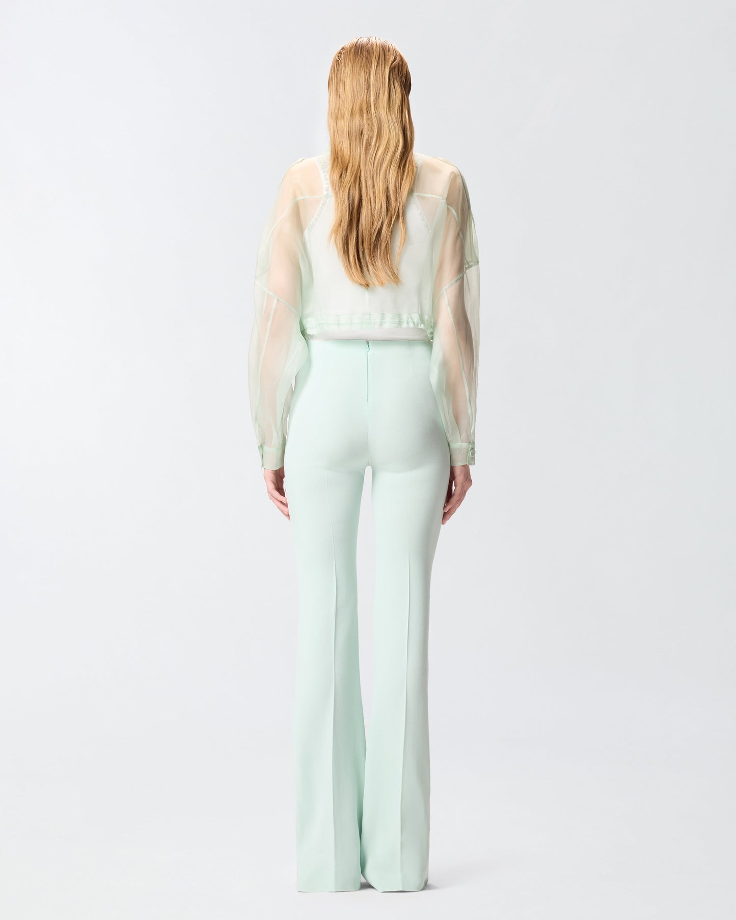 Flared trousers with pressed pleat detail