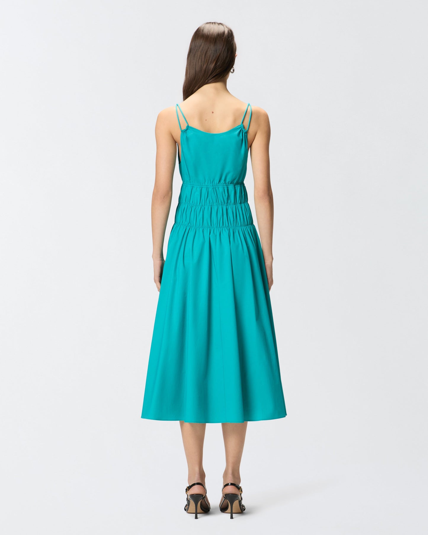 Sleeveless midi dress with pleats and gathering