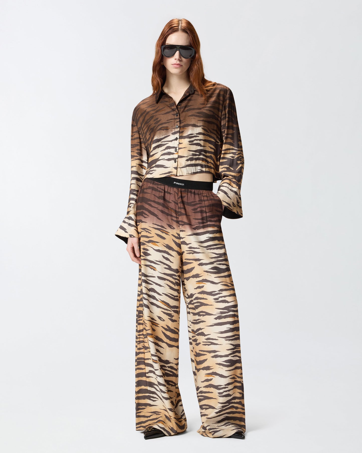 Fluid trousers with tiger print