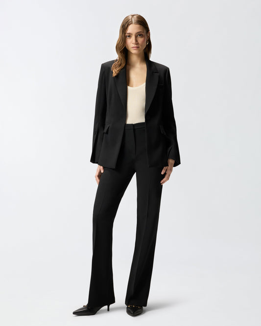 Trousers with pressed pleat detail