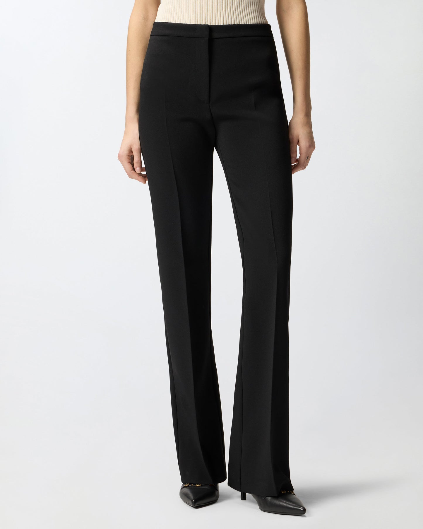 Trousers with pressed pleat detail