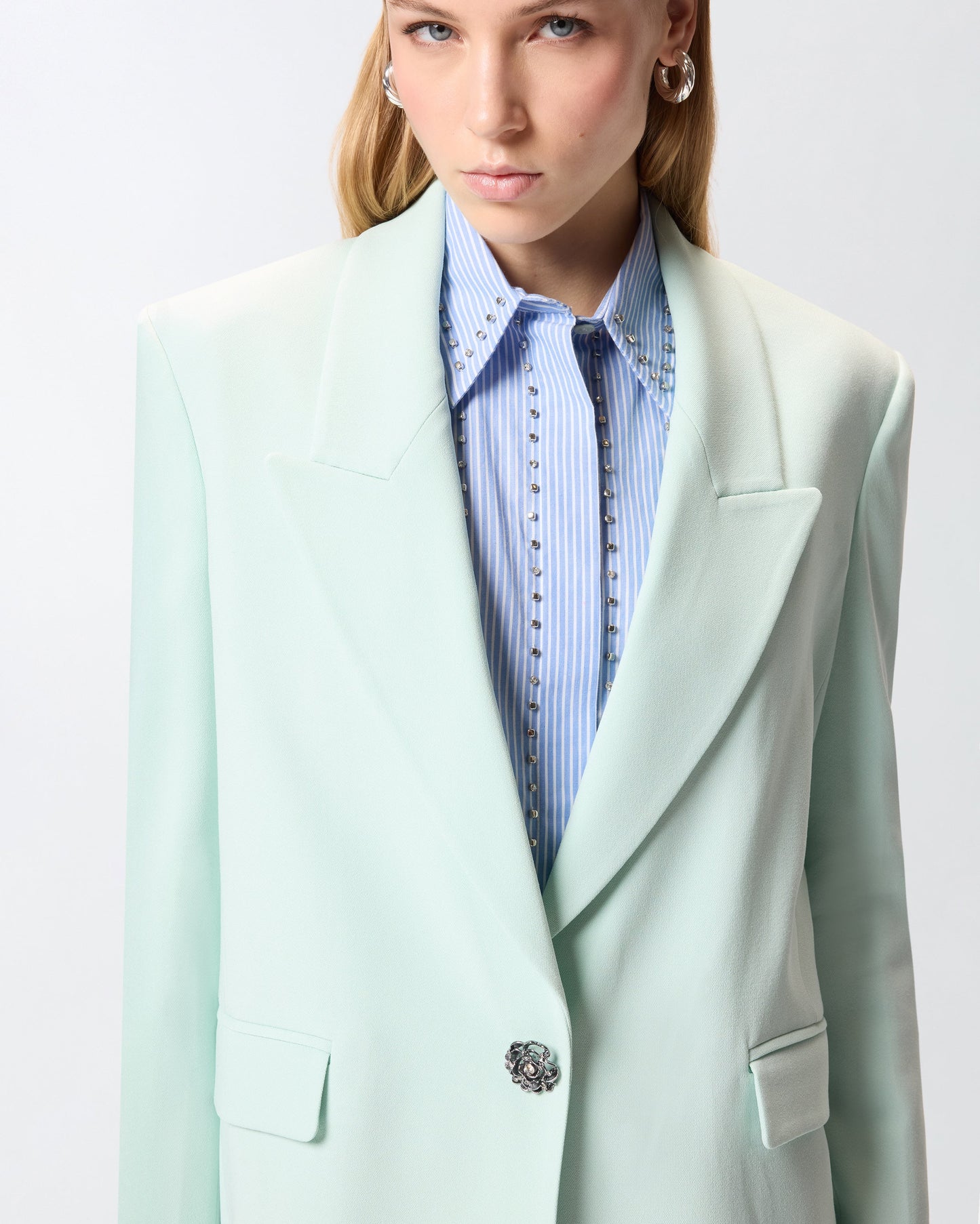 Jacket with rose jewel buttons