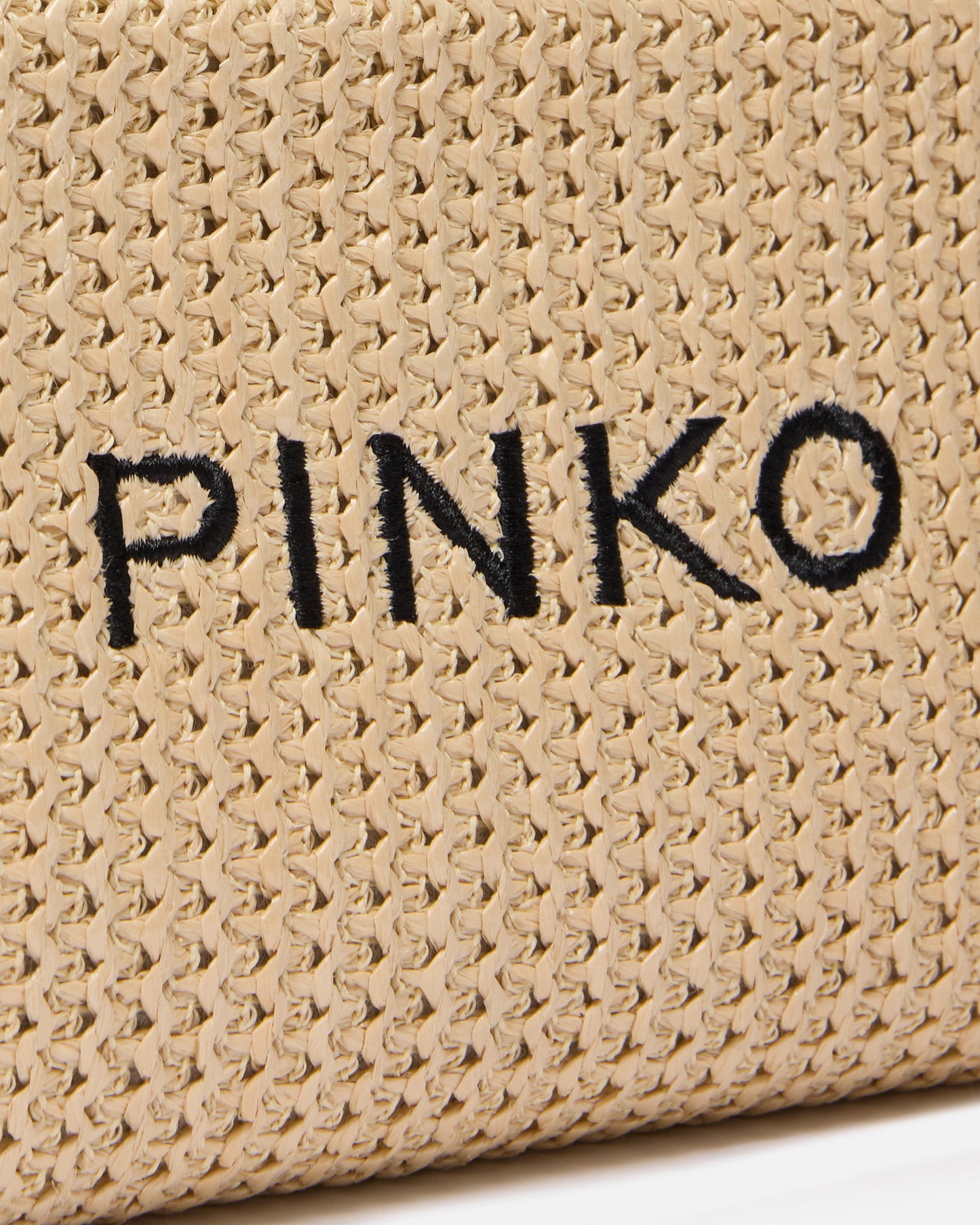 Small raffia bag with logo and handle