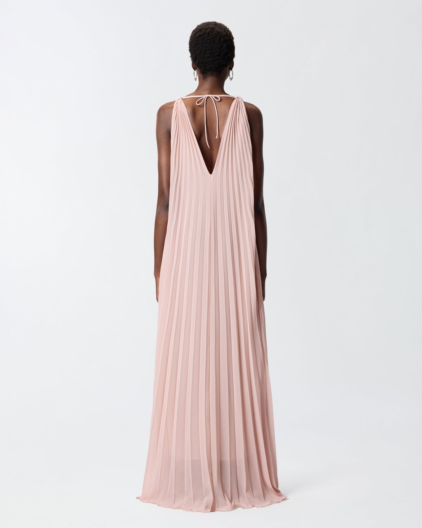 Long pleated dress with slit