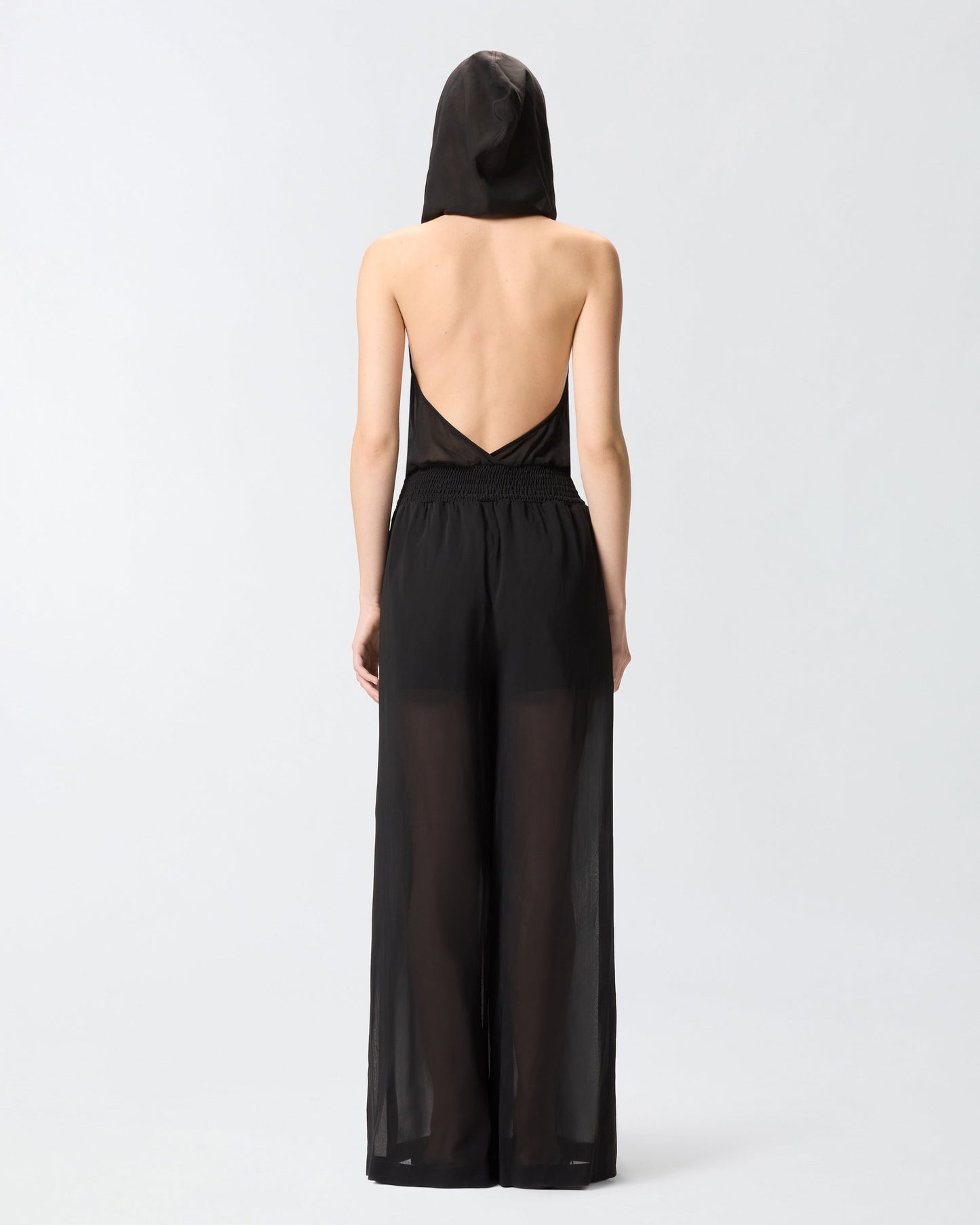 Long playsuit with hood and sheer details