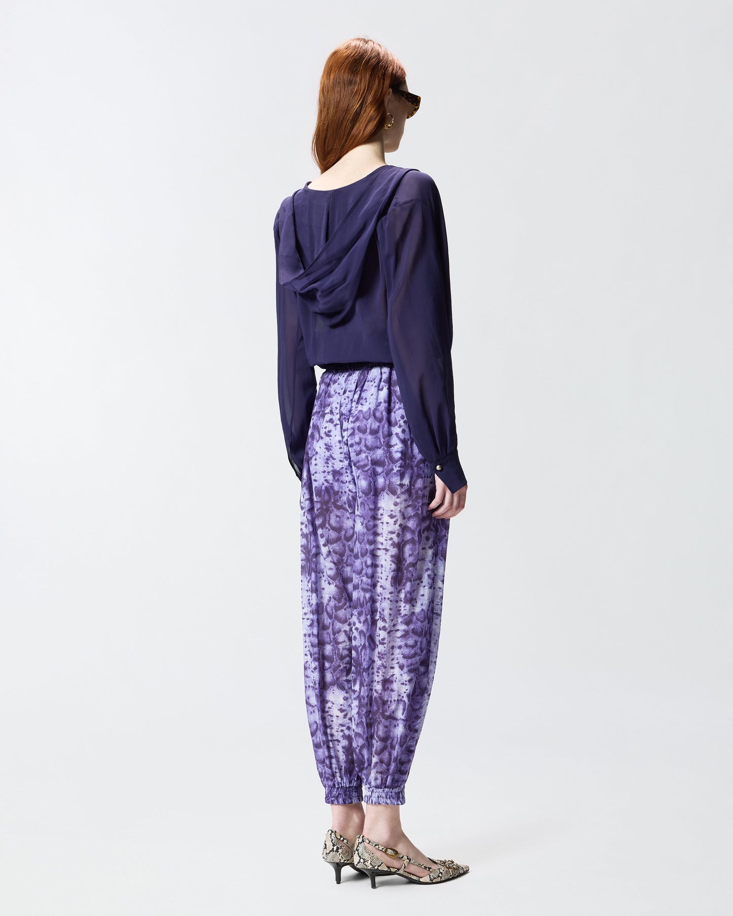 Cropped blouse with hood and sheer details