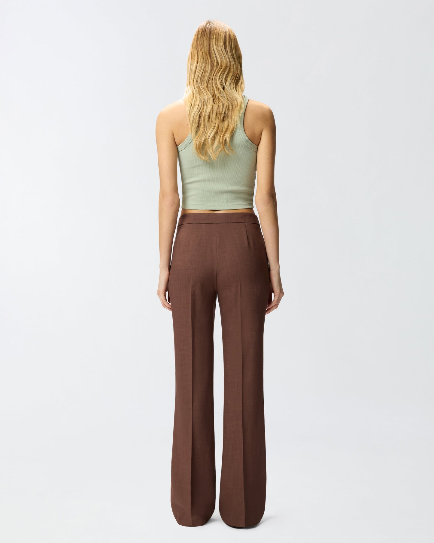 Trousers with pressed pleat detail