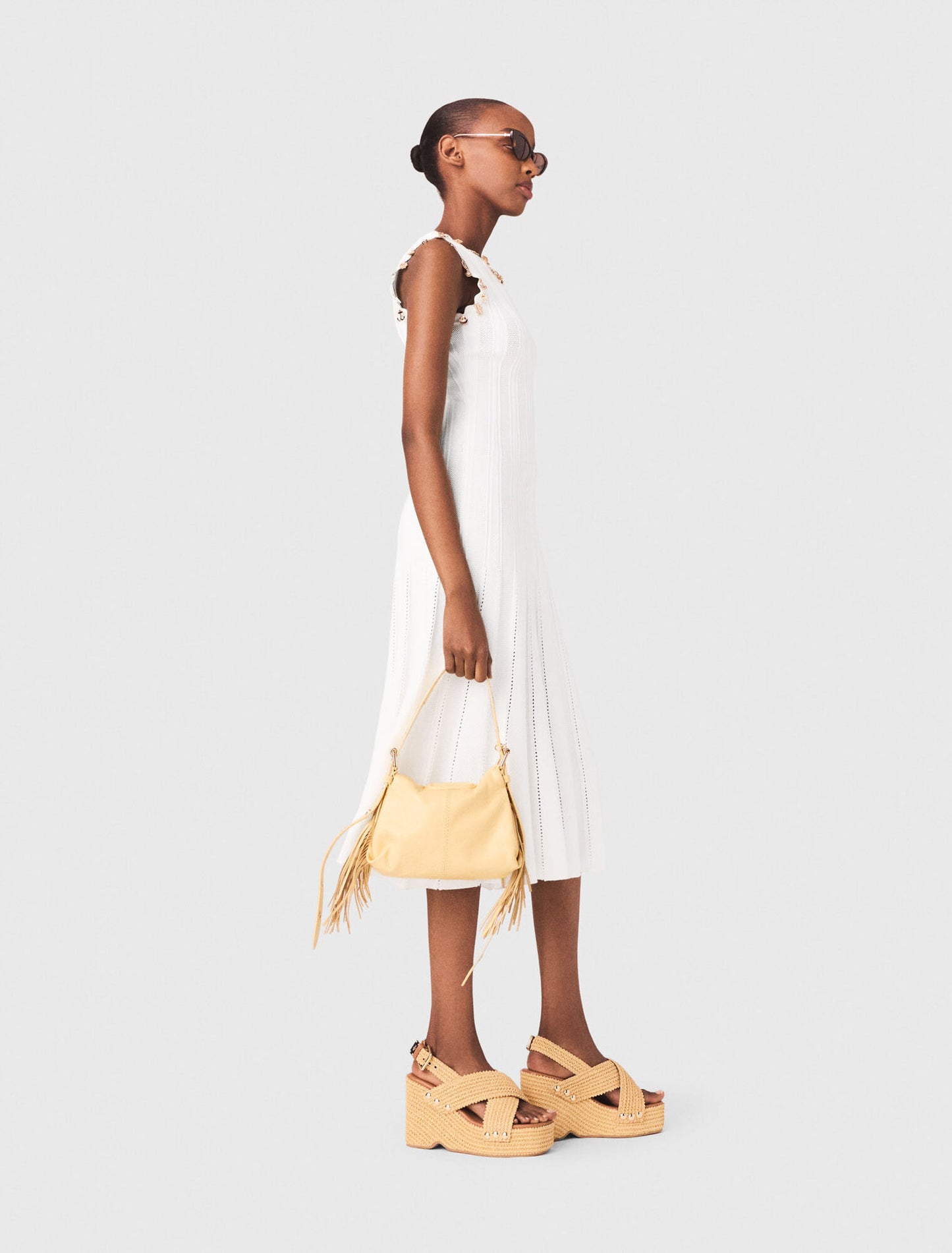 Knit dress with gold jewellery