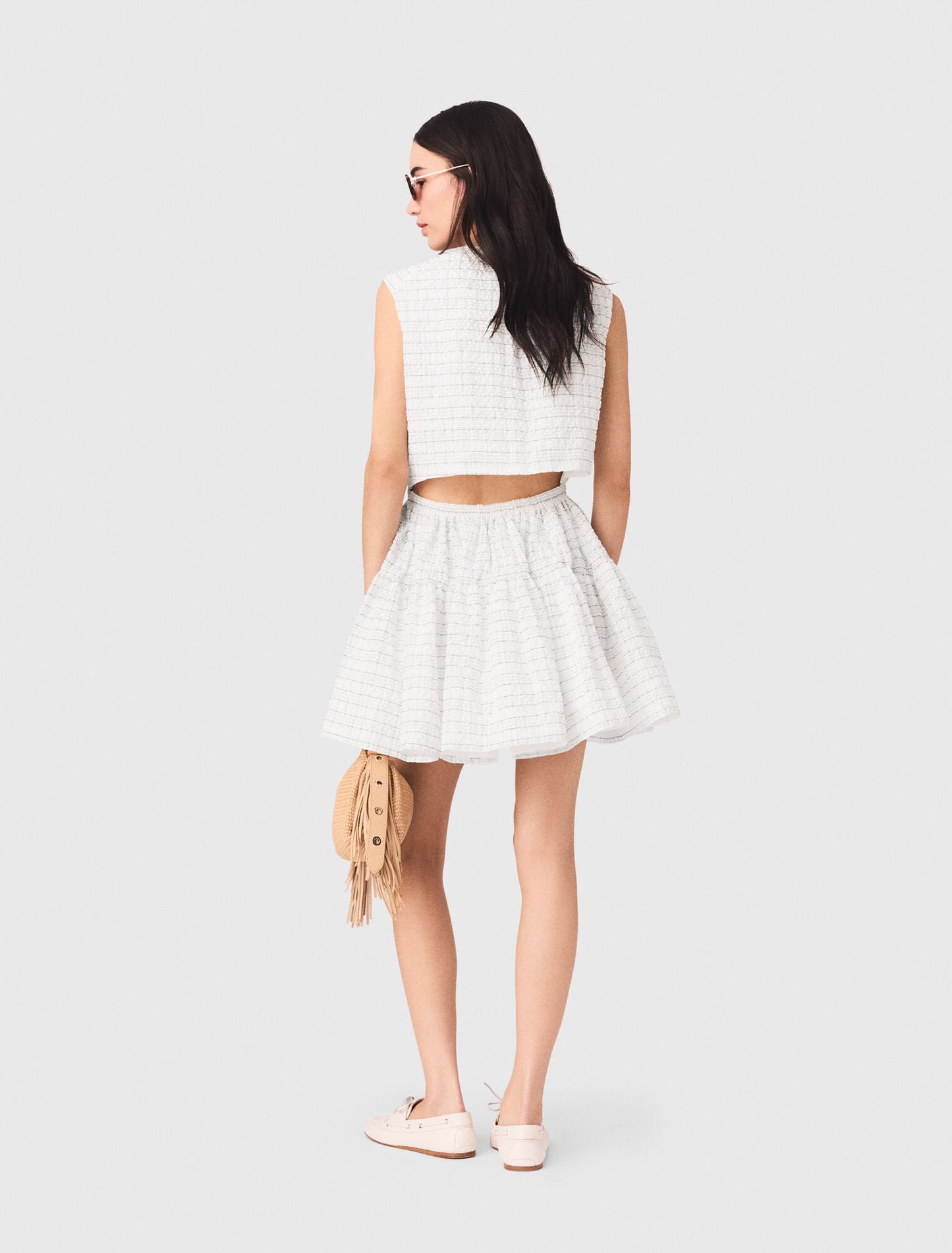 Short flared open-back dress