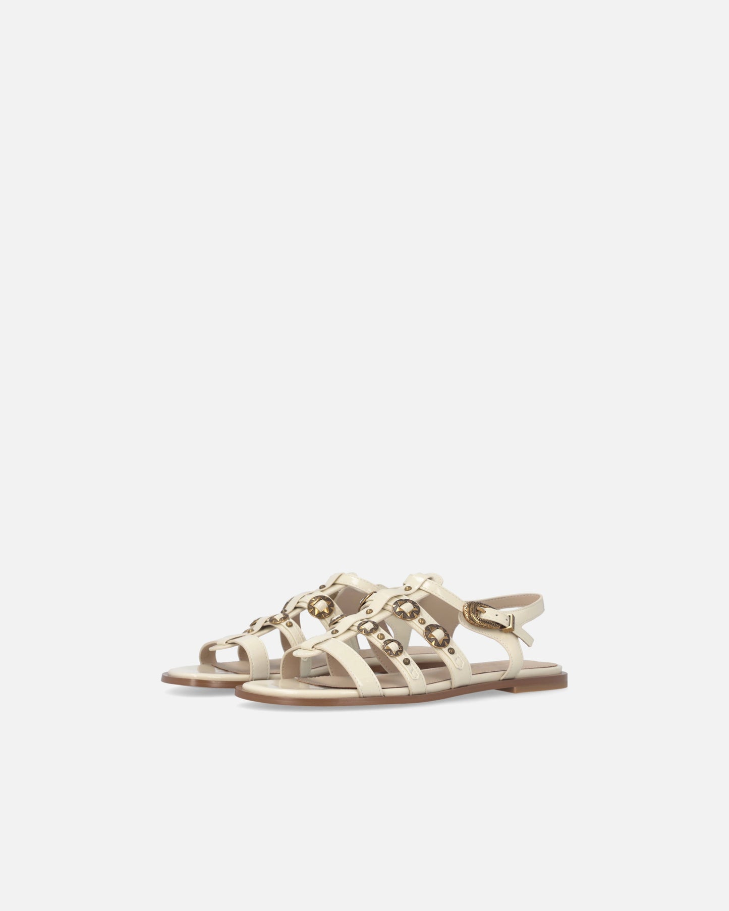 Flat sandals with straps and studs
