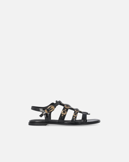 Flat sandals with straps and studs